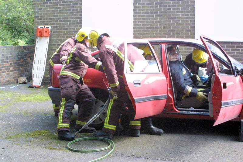 Firefighters in a car rescue display