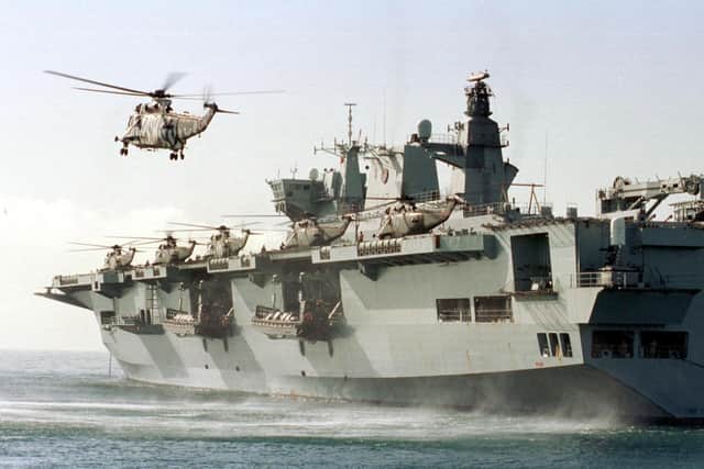 HMS Ocean launches her 6 helicopters during Amphibious Operations during Exerise Saif Sareea II 19 Oct 01 taken from HMS Fearless LCU off Oman.