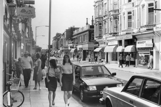 Shoppers take a stroll down Osborne Road in August 1982 but how many of the businesses do you recognise? Did you ever dine at Le Petit Escargot or book a holiday through Renwicks Travel?