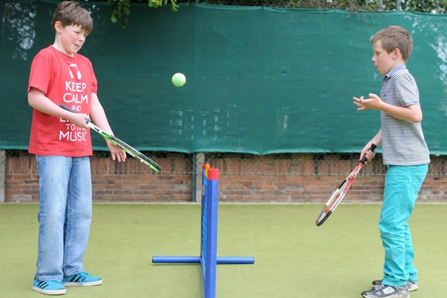 James and Peter Martin learning tennis skills during the open day at Boldon Tennis Club in 2013.