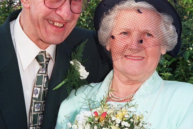 3 year-old Marjory Clarke, of Sprotbrough, and 68 year-old Jack Anson, of Intake, who tied the knot at Doncaster Register Office on Valentine's Day in 1998