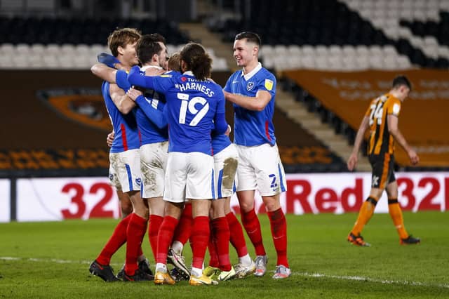 John Marquis of Portsmouth celebrates after scoring their second goal to make the score 0-2 during the Sky Bet League One match between Hull City and Portsmouth at KC Stadium on December 18th 2020 in Hull, England. (Photo by Daniel Chesterton/phcimages.com)
