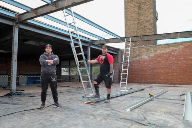 The former Mansfield Road fire station building, in Birley, is set to stay under plans to convert it to a new use. Former policeman and strong man Phil Roberts, and plumber Tom Lee, have started work to convert the former fire service base into a gym and café – and they hope to also create a climbing wall on the site’s tower.