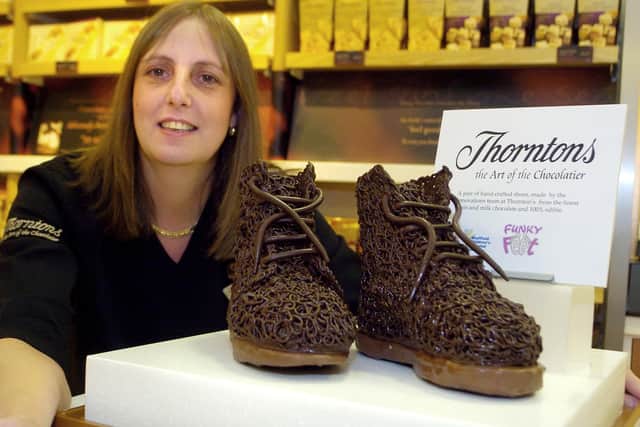 Chocolate shoes pictured with Sharon Morley, Thorntons Store Manager, Meadowhall as part of the Fit Feet campaign