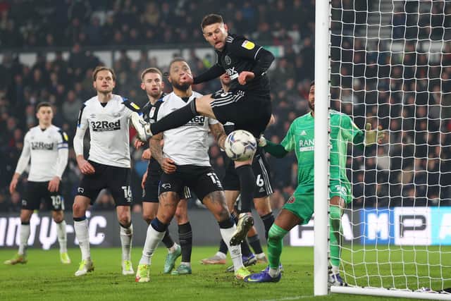 Oliver Norwood of Sheffield United watches the ball bounce clear of his goal against Derby County (Mark Thompson/Getty Images)