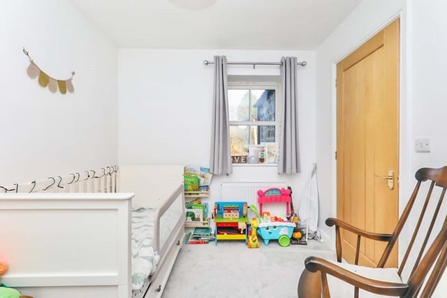 The fourth bedroom at the £450,000 property is also three-quarter-sized. But there is room for it to be comfortably used by adults, as well as youngsters. It has a carpeted floor and a double-glazed window facing the back of the house.