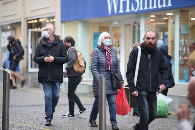 Shoppers wearing a face masks in Sheffield city centre, as South Yorkshire is the latest region to be placed into Tier 3 coronavirus restrictions