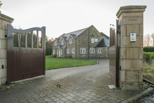 Bradley Hall says the mansion "is welcomed by private electric gates", adding: "There is also a triple garage and parking for numerous cars. The plot surrounding the property is mainly laid to lawn with mature trees."