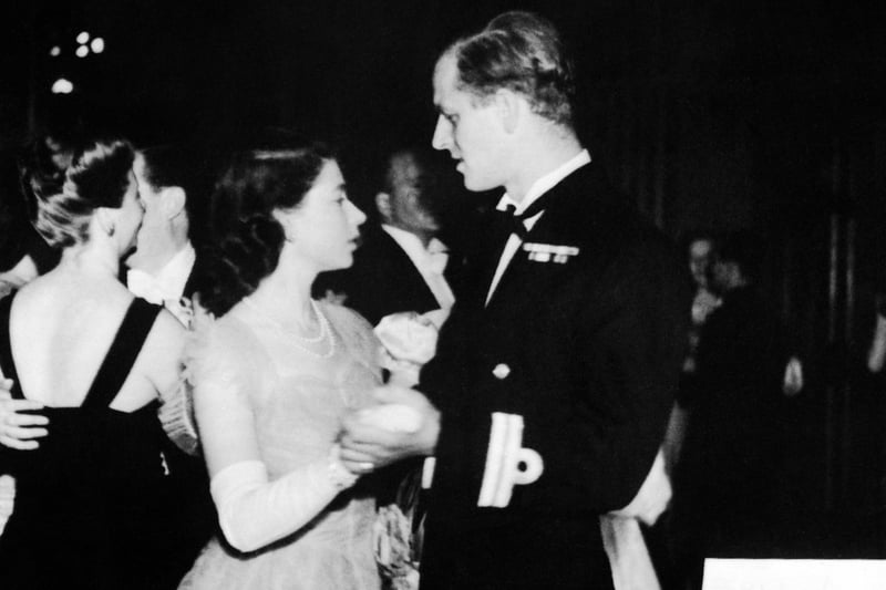 Princess Elizabeth dancing with her fiance, Lieutenant Philip Mountbatten, RN, at the Assembly Rooms, Edinburgh, in 1947, when a ball was held to welcome the royal family to Scotland.