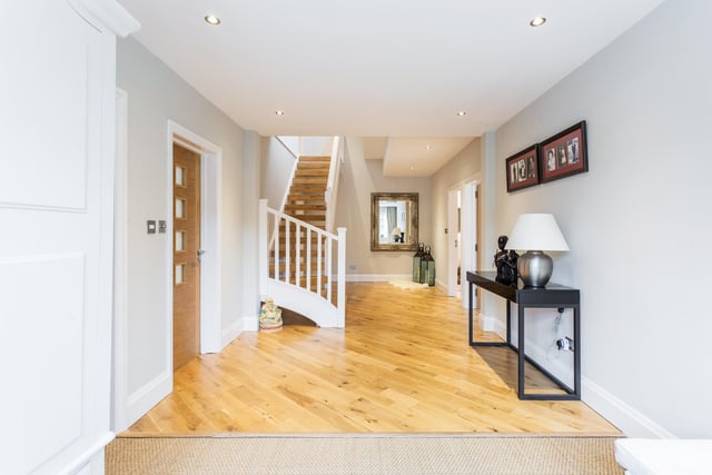 The "substantial entrance hall" provides access to the ground floor accommodation.