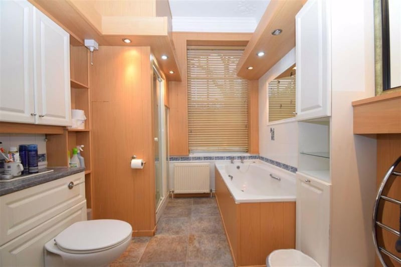 Bathroom with separate shower.
