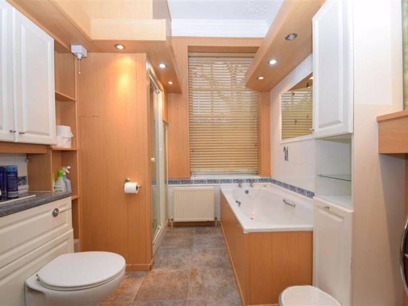 Bathroom with separate shower.