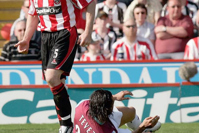 Chris Morgan dumped Carlos Tevez on the turf when United played West Ham - but the striker had the last laugh