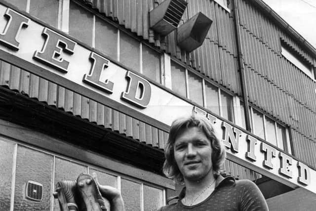 Tony Currie with his boots at Bramall Lane