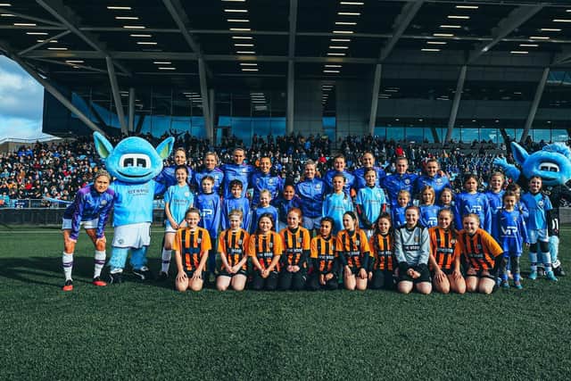 The team at the Man City WFC game against Chelsea