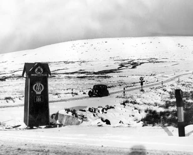 Woodhead Road looking up the road to Holmfirth by the AA phone box in 1953.