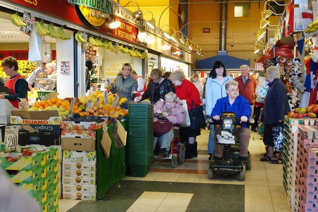 Plenty of shoppers in this 2003 scene. Can you spot someone you know?