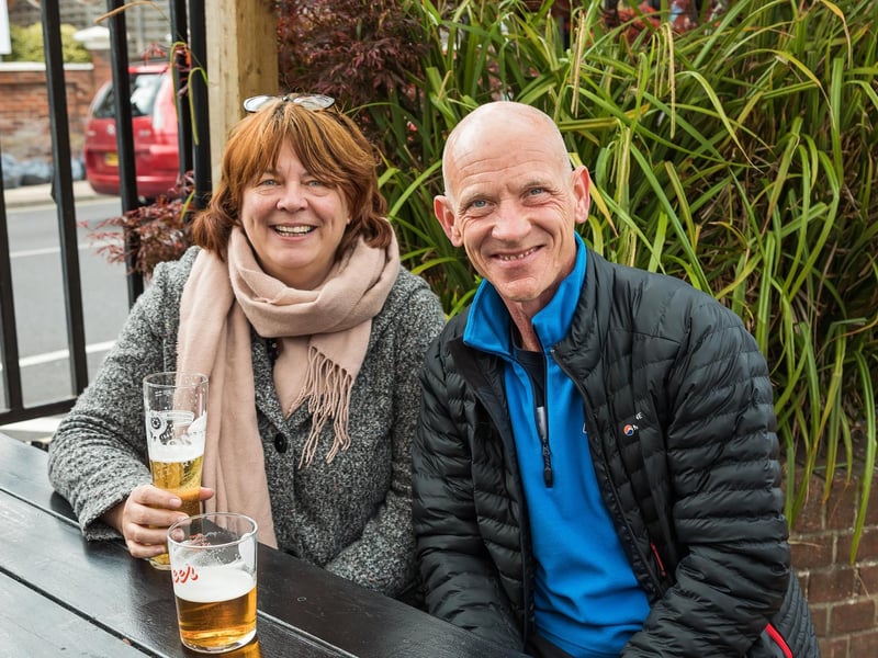 Alison Van Laar (51) and Fintan Murray (56) enjoy a beer in the garden at O'Neills on Albert Road. Picture: Mike Cooter (DDMMYY)