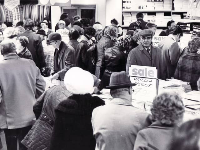 A busy sale scene in the gents department at Walsh's Department Store, High Street, Sheffield in January 1976