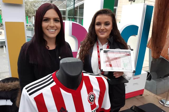 Sam French and Molly Ahmed, from Compass, recruiting for Sheffield United at the jobs jamboree at the Wintergarden