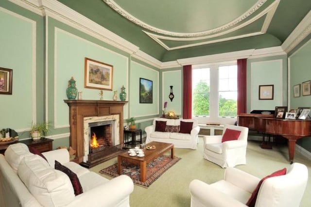 Like much of the property the drawing room boasts high ceilings, and lots of natural light. Here you will also find a door to the south terrace.