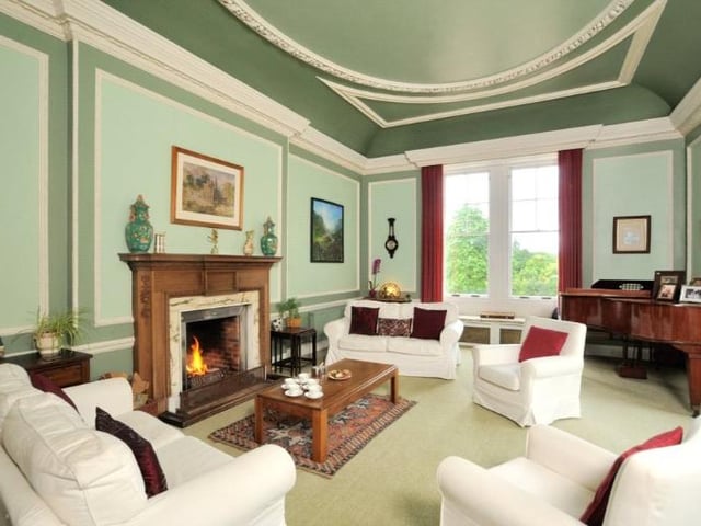 Like much of the property the drawing room boasts high ceilings, and lots of natural light. Here you will also find a door to the south terrace.