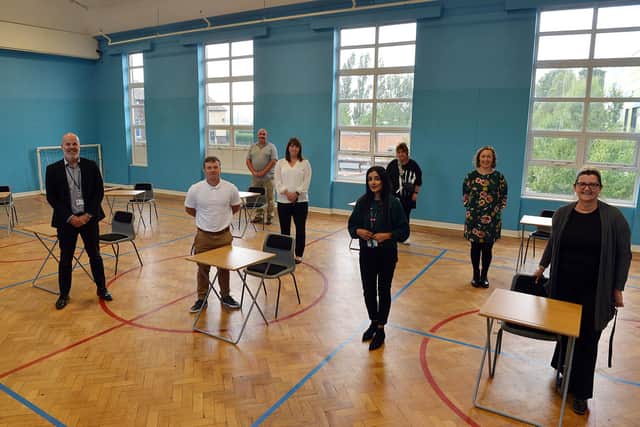 Members of staff at the Sheffield Inclusion Centre showcasing a socially distanced classroom