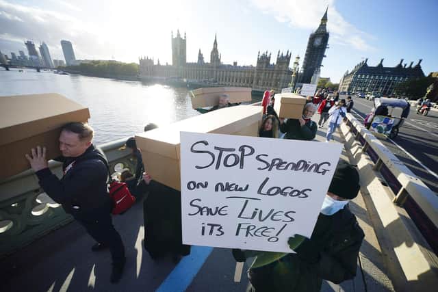 Demonstrators protesting against smart motorways march with coffins across Westminster Bridge to Parliament Square in London. Picture date: Monday November 1, 2021. PA Photo. See PA story TRANSPORT Smart. Photo credit should read: Aaron Chown/PA Wire