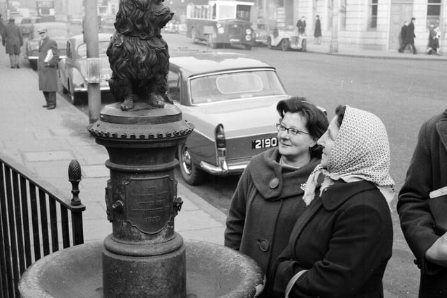 The 1963 case of the missing Bobby was soon solved after students admitted it was a prank. Mrs S Denzie and Mrs J Docherty are pictured admiring the newly-restored statue.