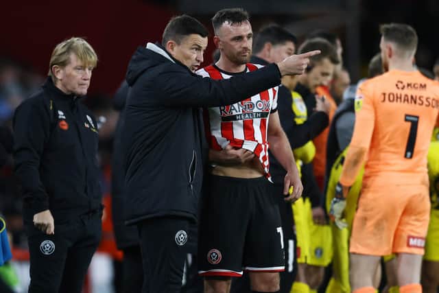 Sheffield United manager Paul Heckingbottom, pictured with Jack Robinson, believes the Bosnia and Herzegovina international will face Cardiff City: Darren Staples / Sportimage