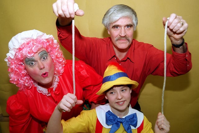 Pictured at the Hansworth Centre, Fitzalan Road, Hansworth, Sheffield, where the Handsworth Amateur Operatic Society performed Pinocchio in 1998. Seen is Amy Foster as Pinocchio, and Duncan Milner as Geppetto the puppet maker, and Steve Mather as the Dame Mama Macaroni.
