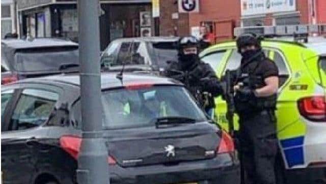 Armed police in Abbeydale Road on April 6, 2019, when firearms were found in a property.