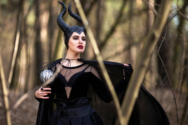 Channel your inner Angelina Jolie and opt for this simple look that just requires a strong contour to create those striking cheekbones, some red lipstick, and winged black eyeliner. Finish the look with Maleficent's iconic horns.