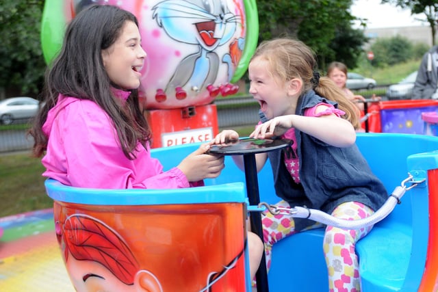Yazmin (left) and Ellie Wright are pictured having fun on one of the rides at a Belle Vue fun day in 2012. Remember this?