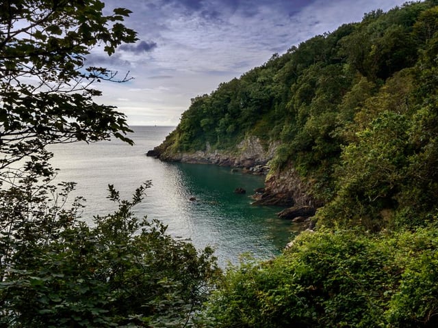 Sugary Cove is situated on the mouth of the River Dart in Dartmouth, Devon, and provides a secluded spot just 20 minutes’ walk from the busy town. The beach can only be accessed by foot or boat, and features a shingle beach where it’s safe to swim (Photo: Shutterstock)