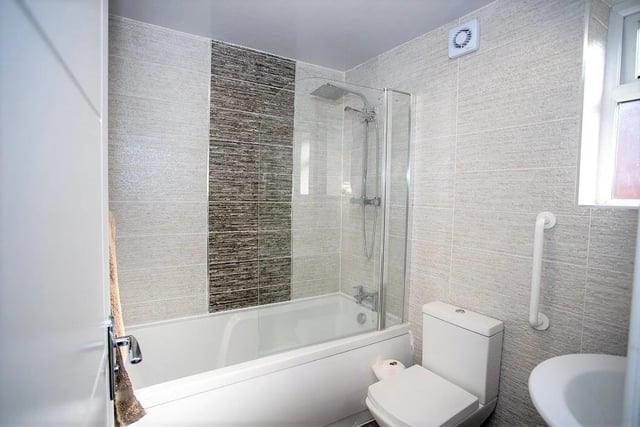 This is one of three bathrooms in the semi-detached house.