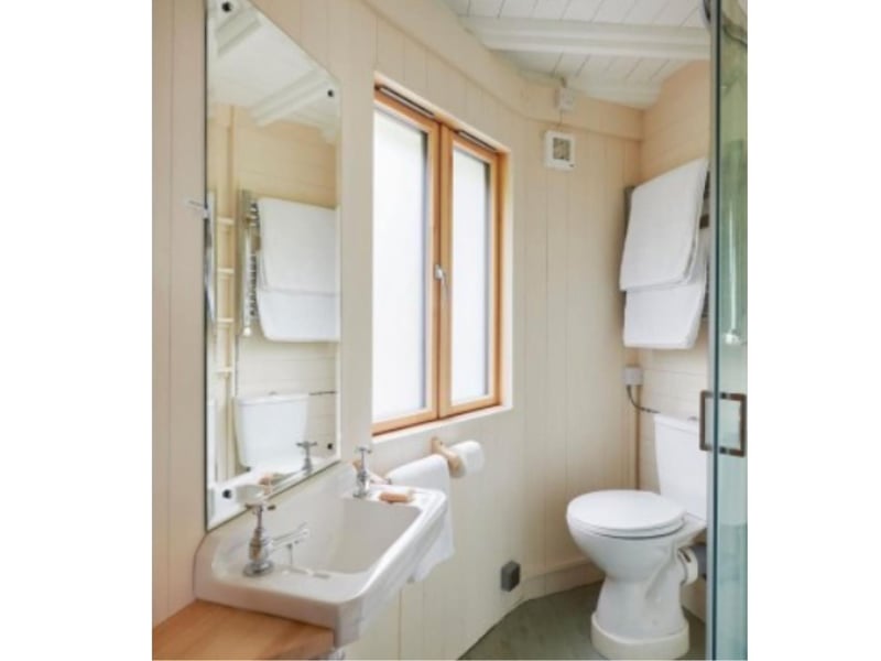 Freshen up in the bright and stylish shower room.