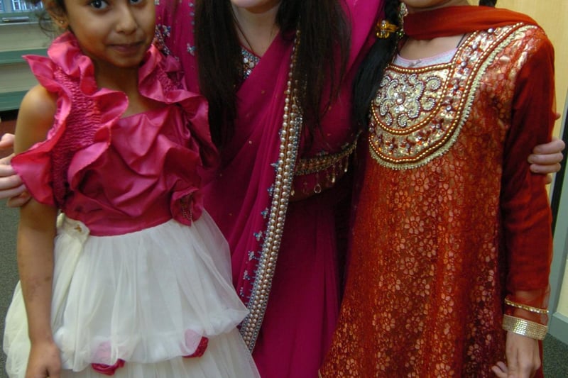 Teacher Rachel Cipriani with children in traditional dress at the multicultural festival at Whiteways Primary School, Sheffield in January 2011