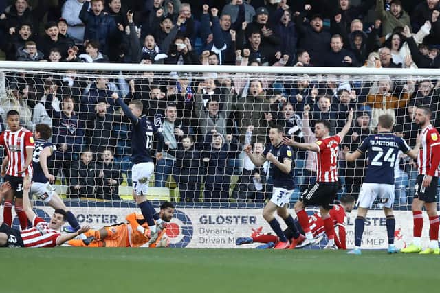 Millwall's Jake Cooper scores his latest goal against Sheffield United: Paul Terry / Sportimage