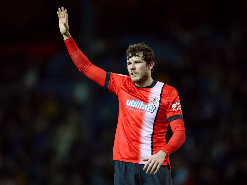 The 26-year-old centre-back became a free agent on 1 September after Luton Town terminated his contract by mutual consent. A Reading academy graduate with more than 120 appearances for the Royals, Holmes had spells at Luton plus loans at Rotherham and in Belgium. Tall and comfortable at centre-back or right-back, he would provide Championship-experienced defensive cover.