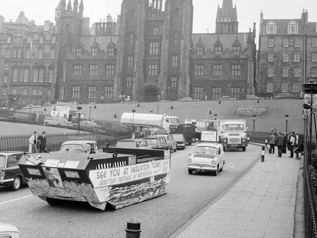 A tank travels down the Mound on its way to Ingliston as part of Edinburgh's Festival of Motoring in July 1965.