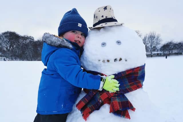 A hug for a snowman made in Bonnybridge (Picture: Louisa Liddell)