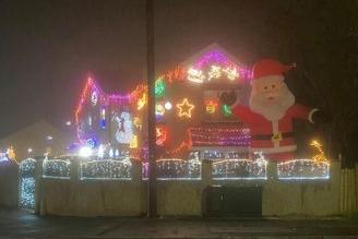 This housing is exuding festive cheer thanks to a giant inflatable Santa!