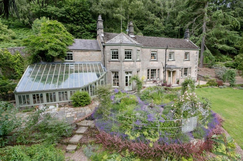 Lumsdale House in Matlock sleeps 10. "Set within landscaped grounds, this wonderful property offers spacious, grand and well-planned accommodation for an experience to be remembered," its description says - inside there's a large drawing room with wood-burning stove, a spacious dining room with an ornamental marble fireplace and a bathroom with a roll-top, claw-foot slipper bath. (https://www.cottages.com/cottages/lumsdale-house-rggm)