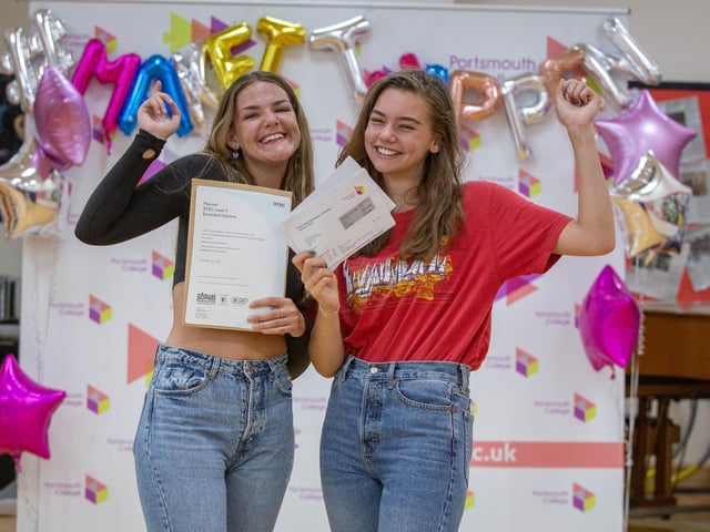 Megan Johnson and Harriet Brown collect their results at Portsmouth College. Picture: Habibur Rahman