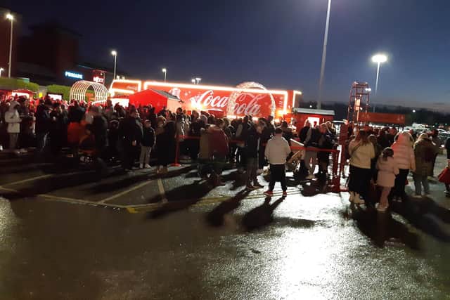 Hundreds of families headed for the bright red Coca Cola Truck as it finally arrived at Meadowhall in 2022.