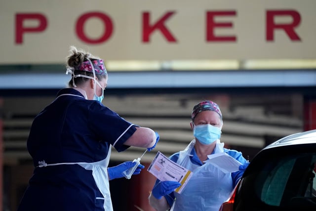 Nurses instruct and help National Health Service (NHS) workers as they self swab for Coronavirus (Covid-19) at a drive through testing site at the Owler Events Centre (OEC),  Sheffield on April 24.