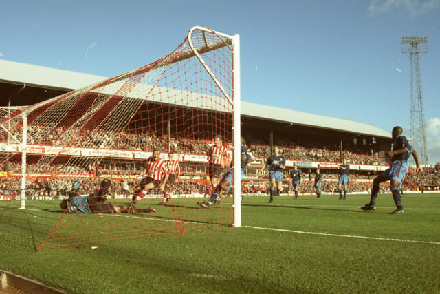 Paul Stewart (right) wheels away to celebrate his winning goal against Aston Villa, to the relief of David Kelly (left) whose penalty was saved at Roker Park.