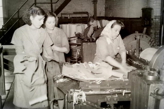 Taken not long before the fire in September 1954 which left the place a shell. This image is of three ladies who look to be cutting wood for match boxes. Photo: Hartlepool Museum Service.