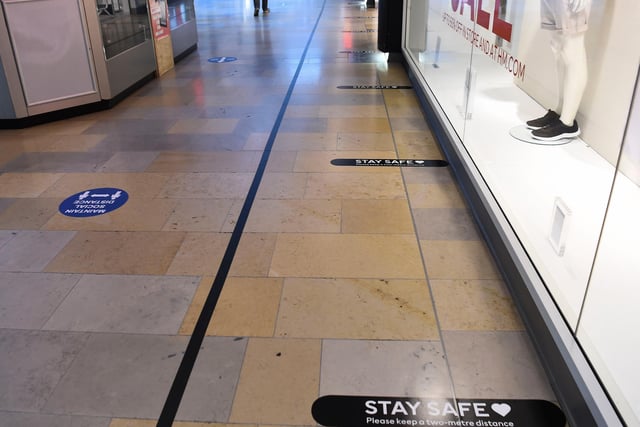 Floor markings are also in place to ensure customers keep a safe distance when queuing outside shops
